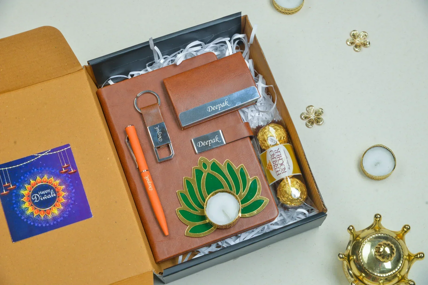 2024 Diwali Combo 2.0 (Classy Metal Flip Card Cover Diary + Classy Metal Keychain + Pen + Classy Steel Cardholder + Ferrero Rocher + Diya) - Brown